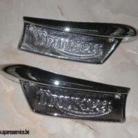 82-9701 - BADGE - TANK - TRI - LH | Triumph